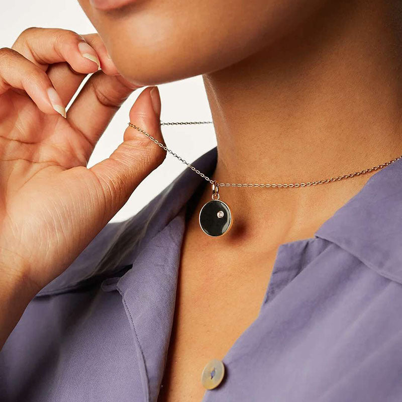 Double-sided sun necklace